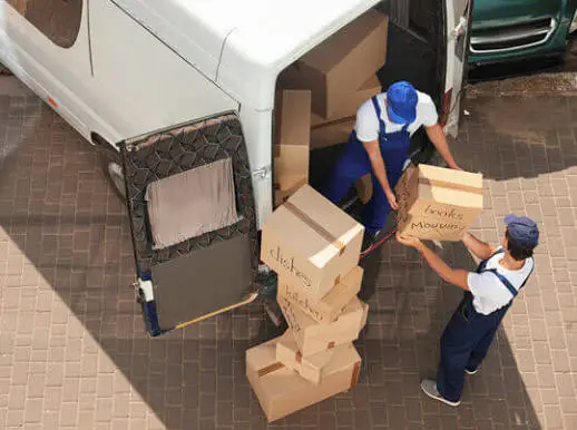 VMove UK removal team unloading boxes for a customer move